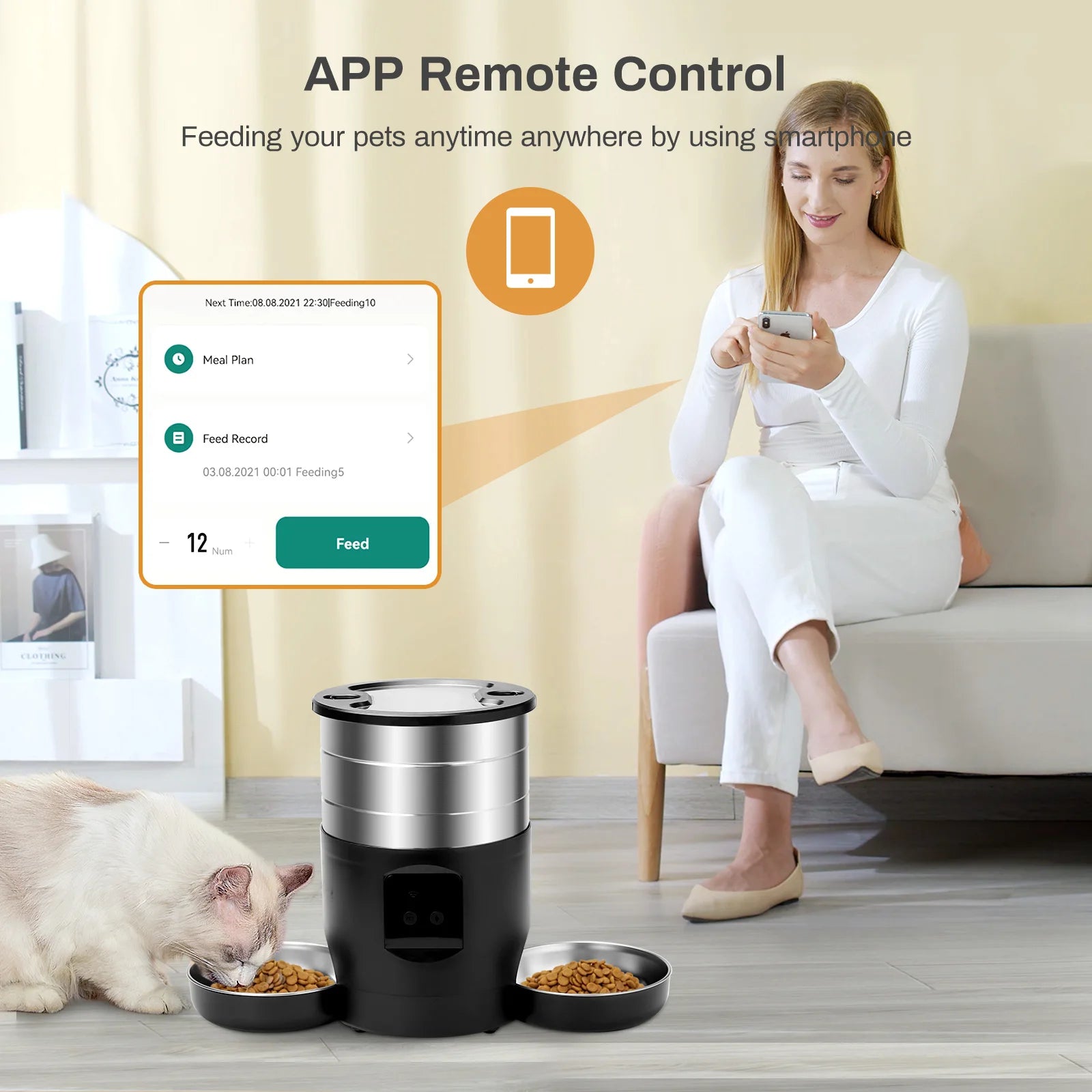 Woman using a smartphone app to control a pet feeder with a cat eating from it.