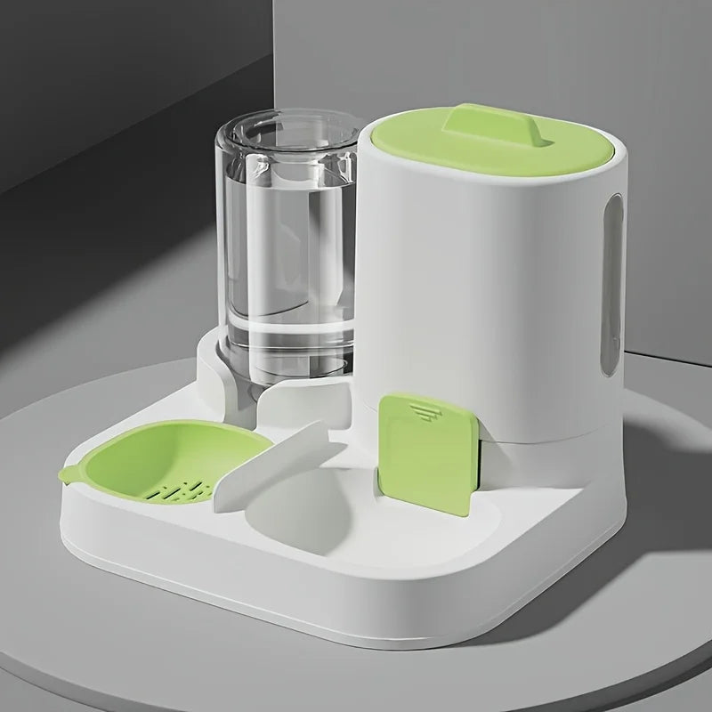 Pet feeder and water dispenser with green accents on a gray surface