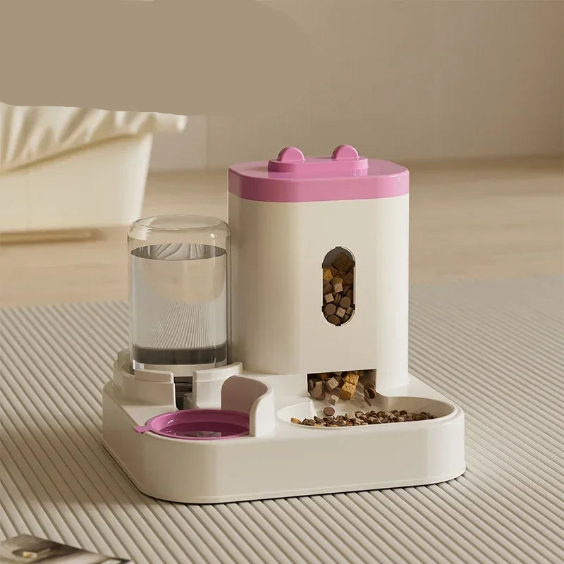 Pet feeder and water dispenser with pink top on a neutral background