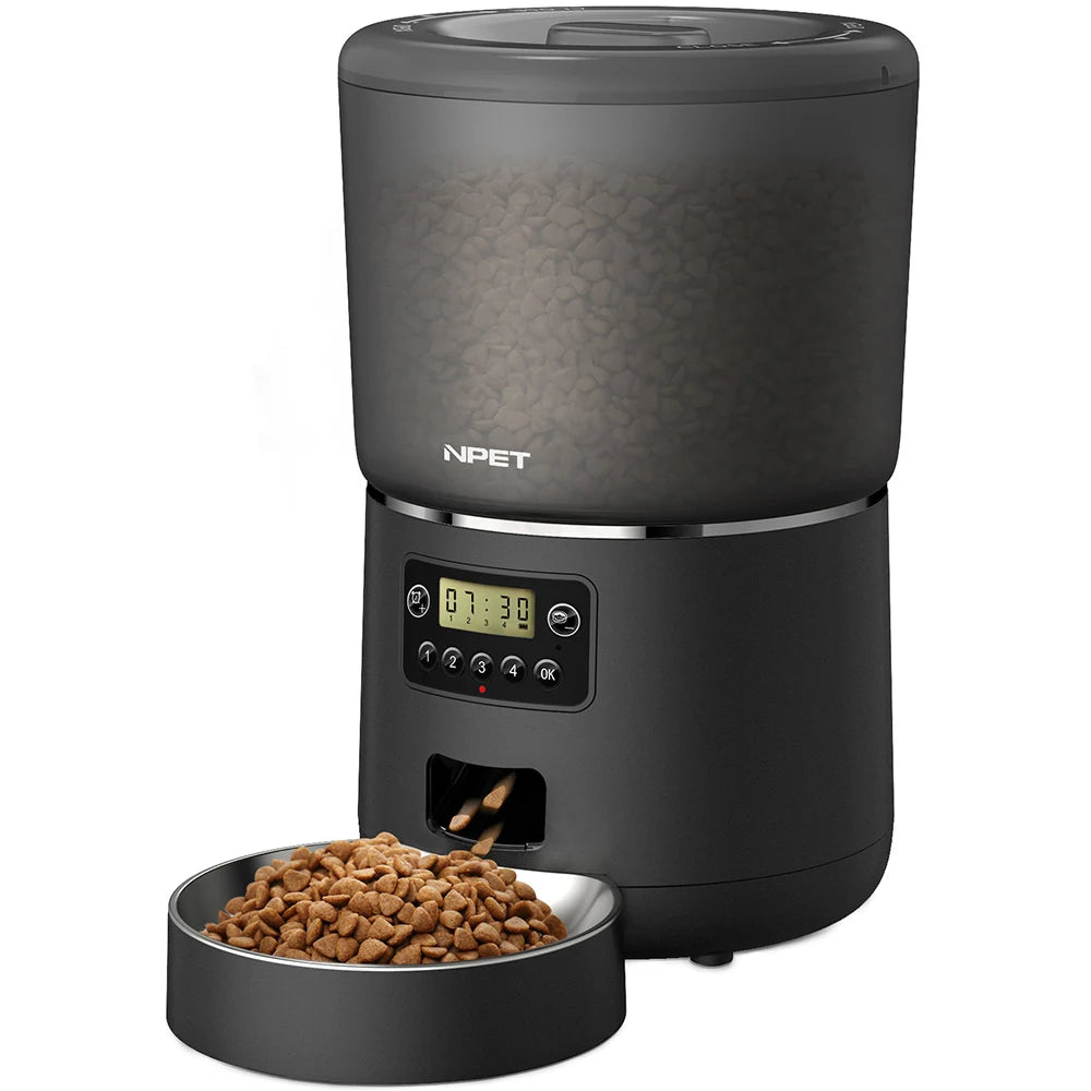 Black pet feeder with digital display and a bowl of kibble on a white background