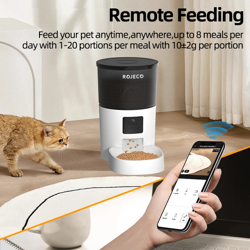 Pet feeder with remote feeding capabilities and a cat interacting with it.