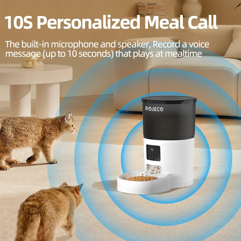 Pet feeder with microphone and speaker for personalized meal calls, shown in a living room setting.